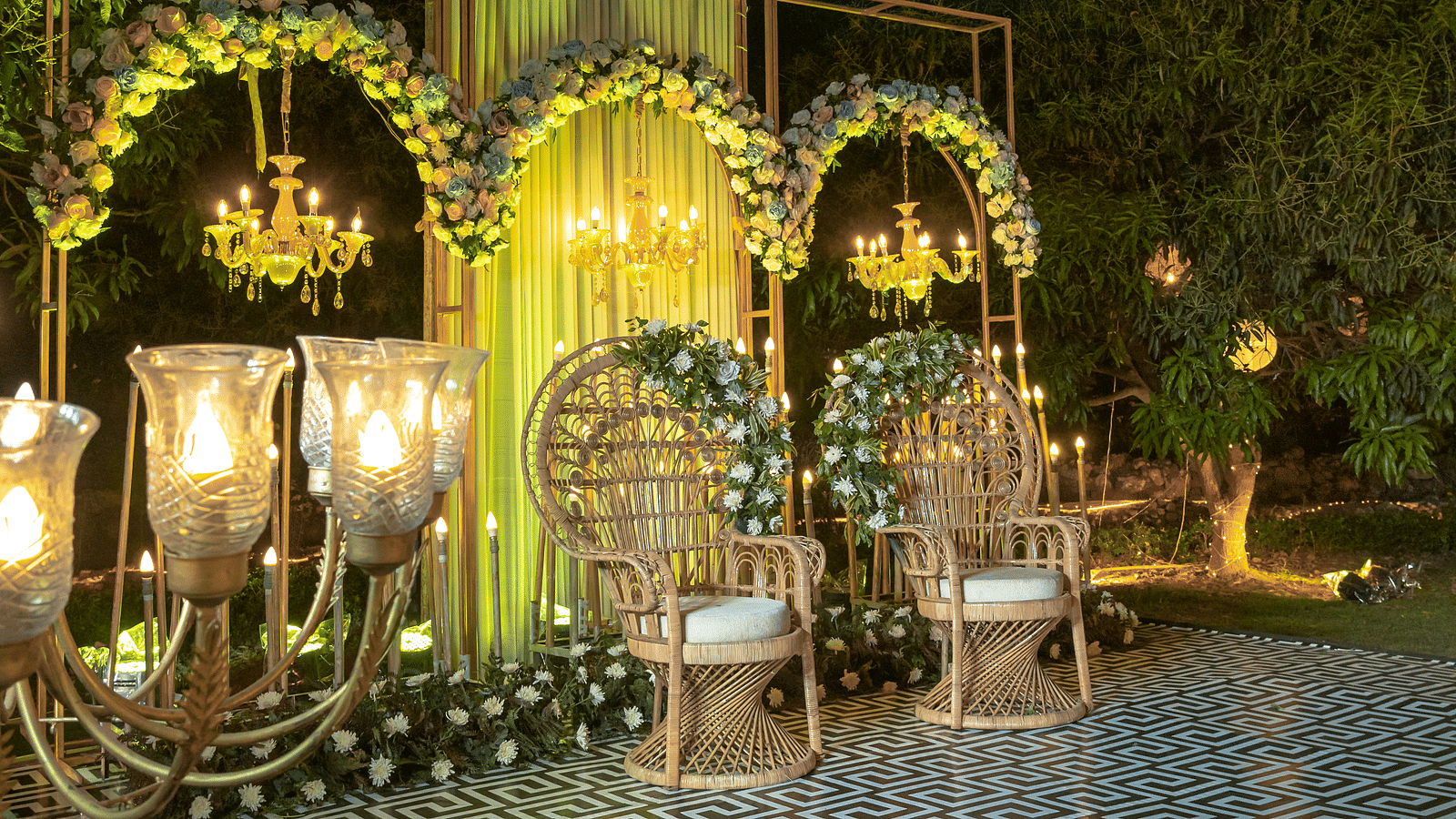 A view of a wedding stage at night at The Sylvan Retreat, Dehradun.