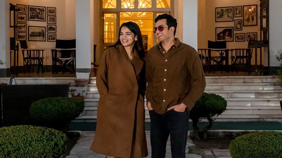 image of a couple outside our hotel in Mussoorie during a sunset
