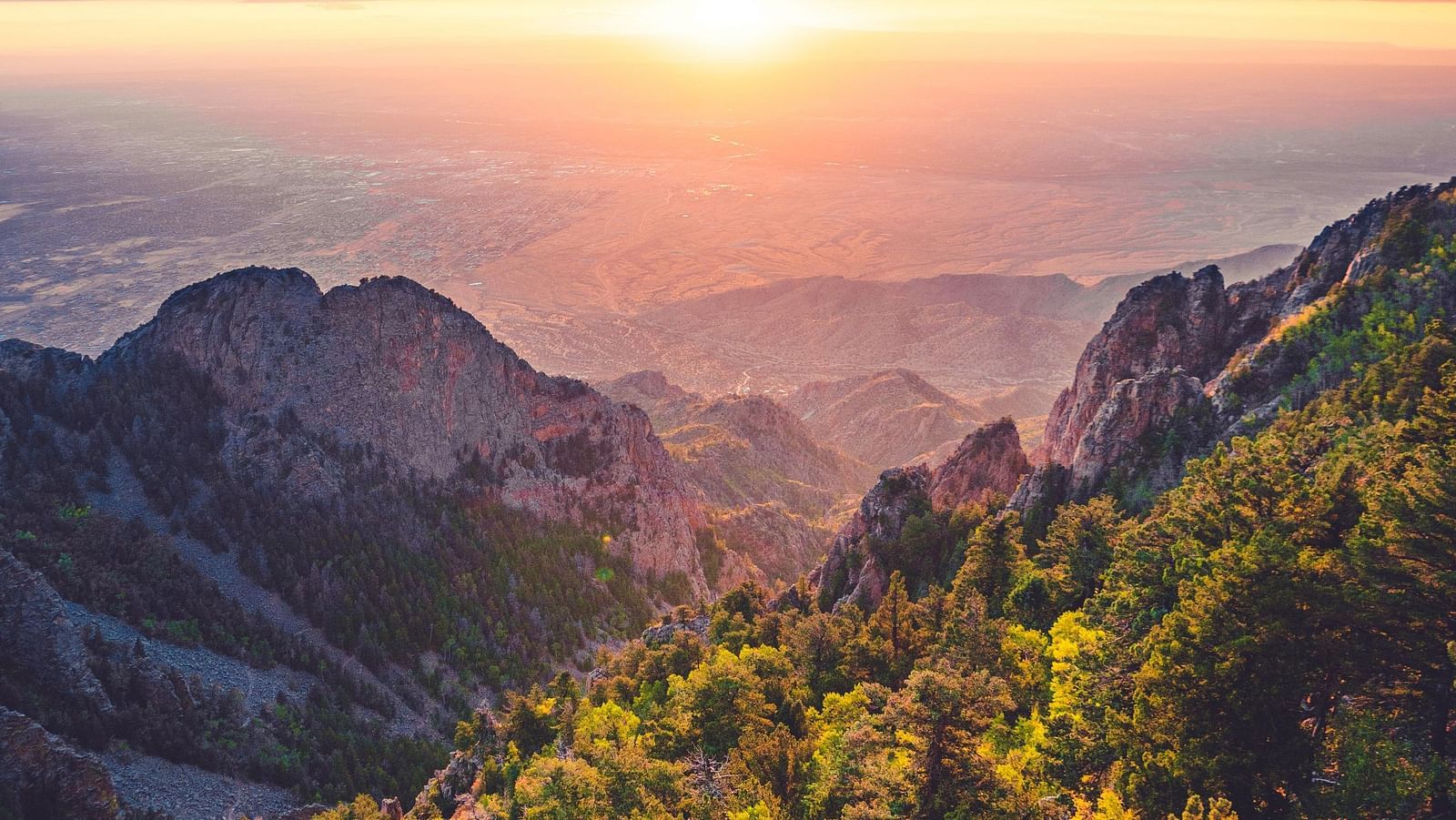 an image of Sunset view from hills with different hues in the sky