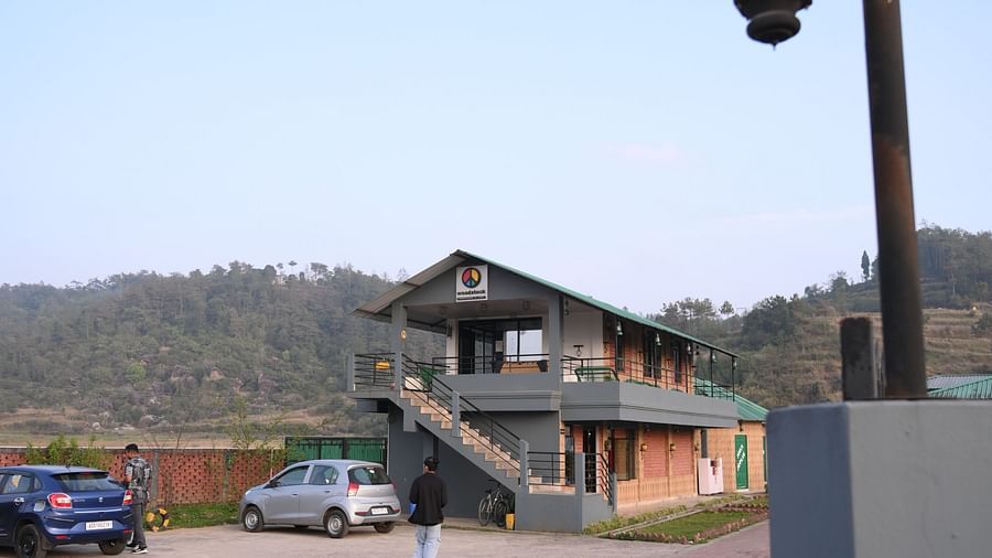 Open gate leading to hotel