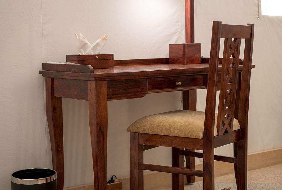 alt-text The work desk and chair provided in rooms - Karwaan Jaisalmer