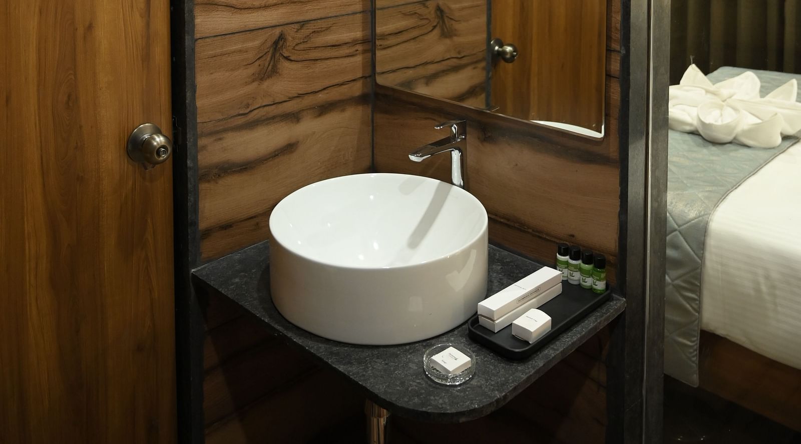 View of a sink in the washroom at Deluxe room at  Mango Leaf Lake Resort, Pune