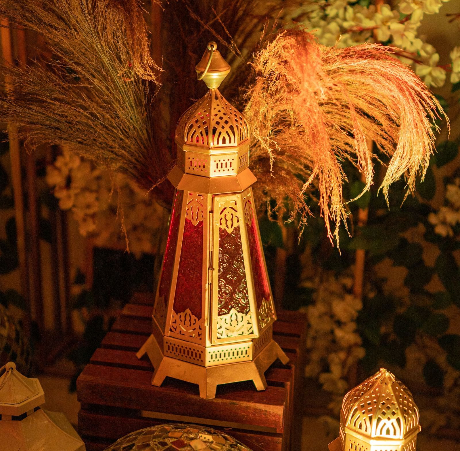 An image of a candle lights placed in a fancy setting 