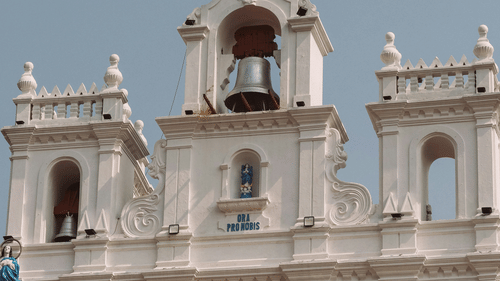 The Our Lady of the Immaculate Conception Church in Panaji, Goa, a striking white building with a prominent bell tower.