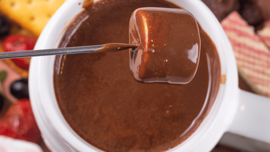 a marshmallow dipped in chocolate at Rosé