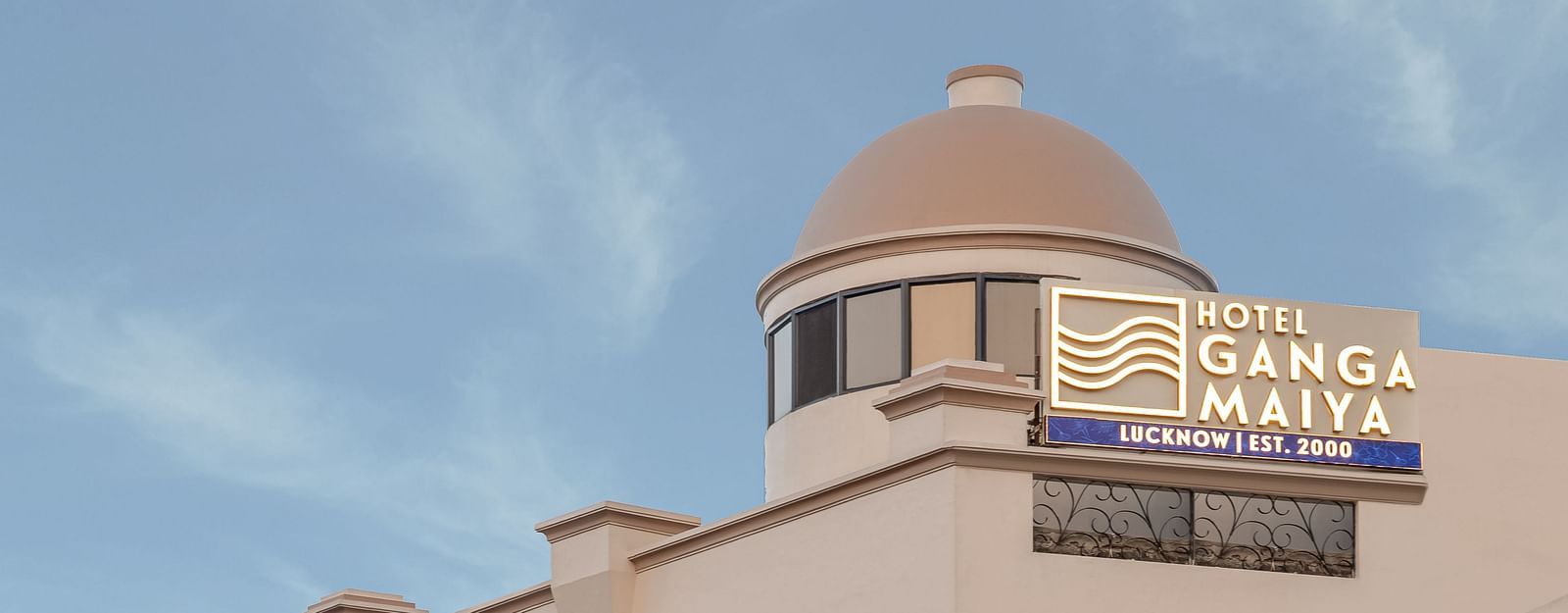Side view of Hotel Ganga Maiya against a cloudy sky | Hotel Ganga Maiya