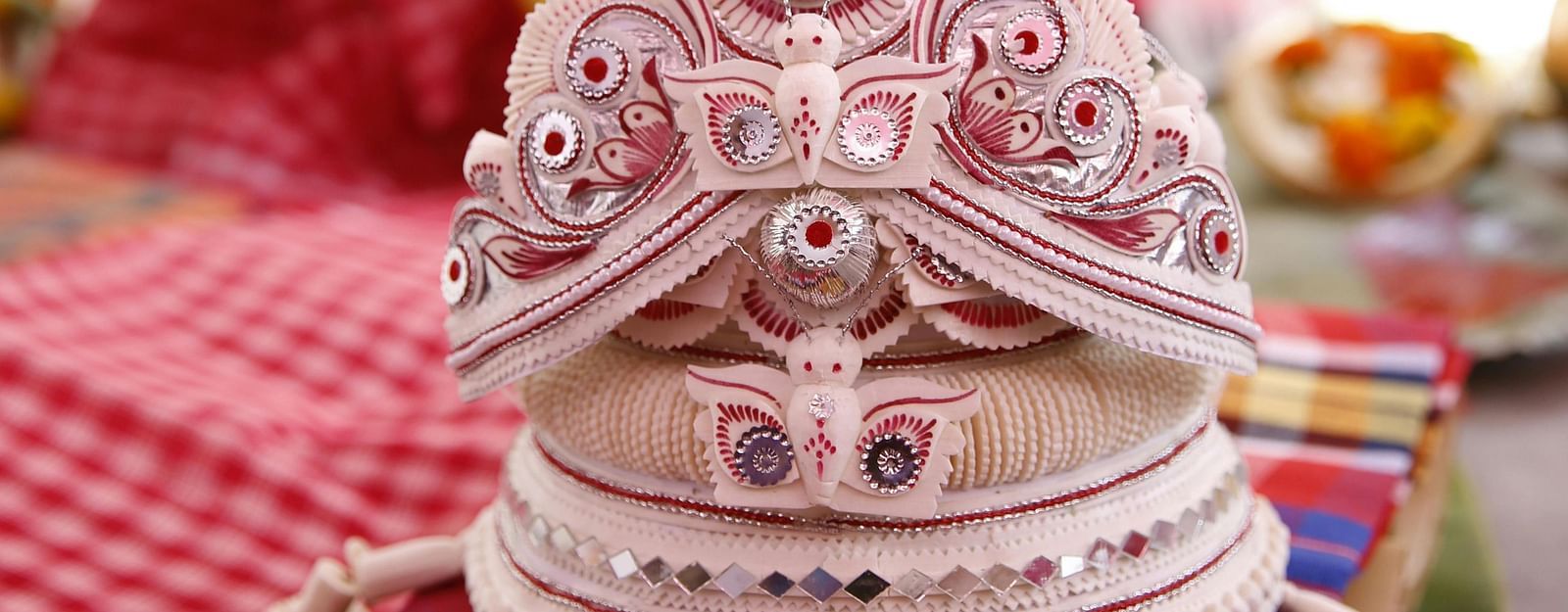 image of a traditional bengali crown for weddings handmade by local artisans with intricate details