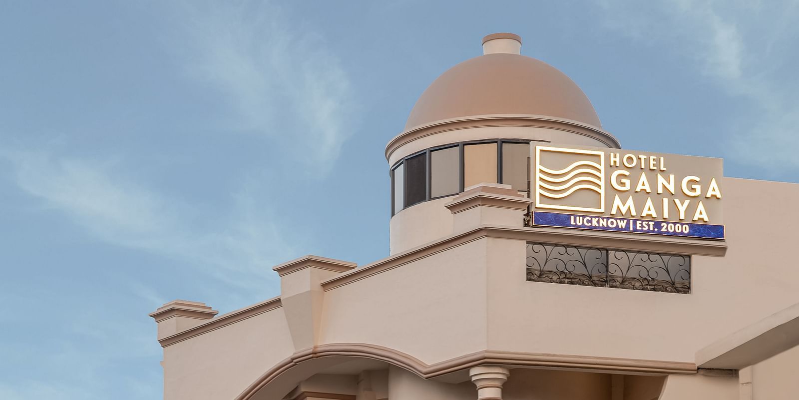 Side view of Hotel Ganga Maiya against a cloudy sky | Hotel Ganga Maiya