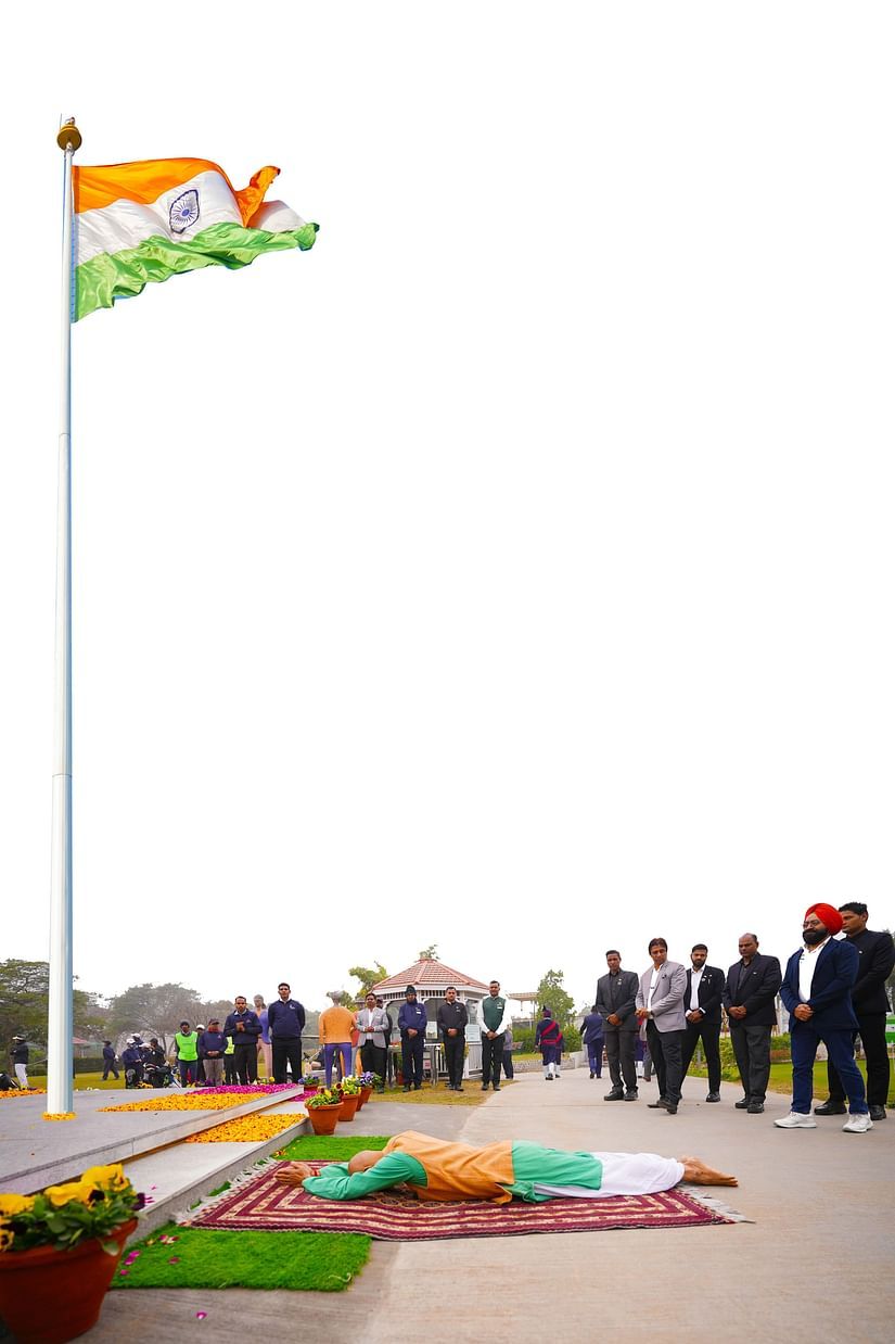 An Indian flag being hoisted during daytime - Karma Lakelands.