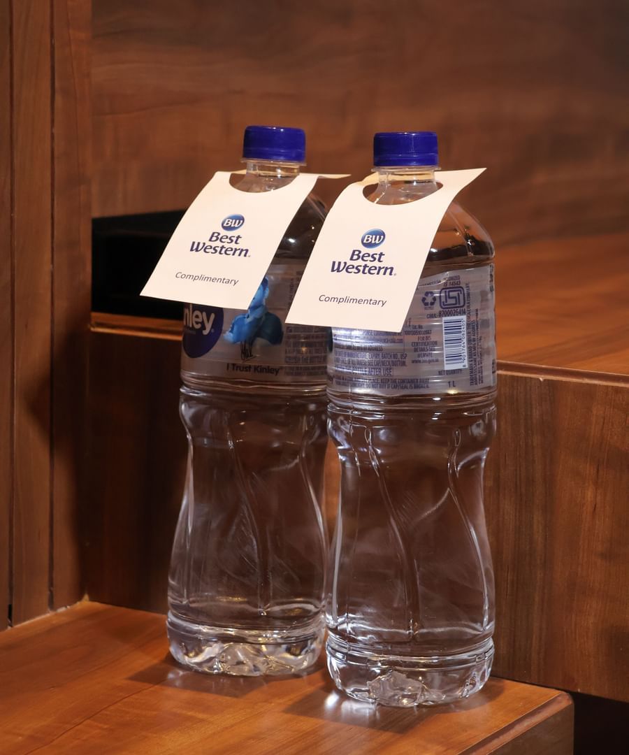 Two water bottles with the Best Western, Vrindavan tags