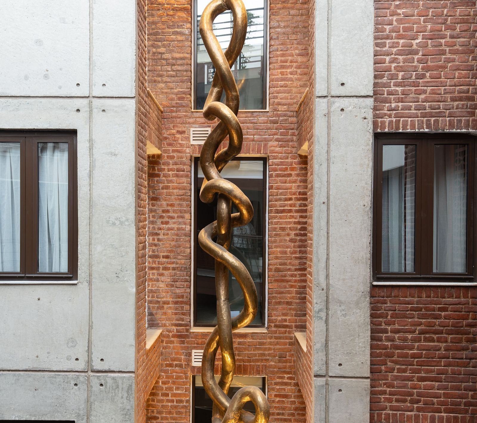 A facade view of the Endless knot Art Sculpture at The Nanee