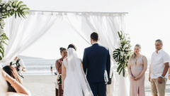 A couple walking down the isle for the wedding ceremony