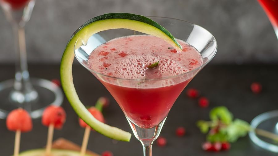 a glass of pink drink - polo floatel kolkata