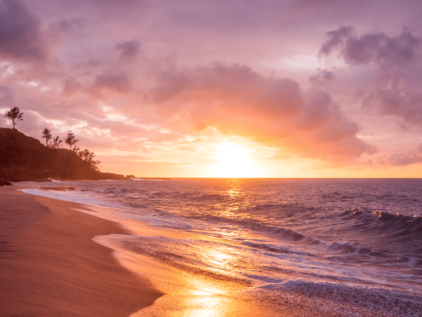 A beautiful view of waves washing the shore during sunset - Tharangambadi Places to Visit