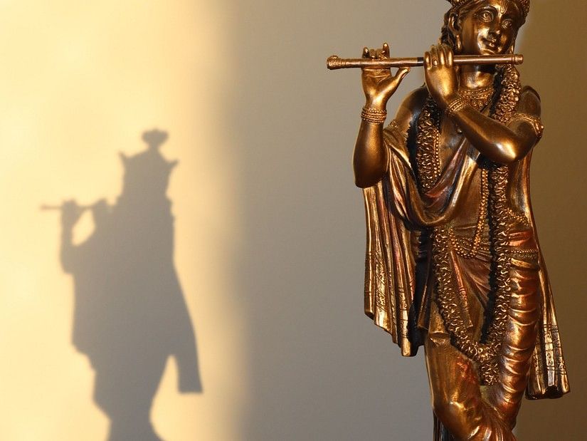 idol of Lord Krishna playing the flute
