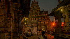 Man walking towards the magnificent Tirupati Temple