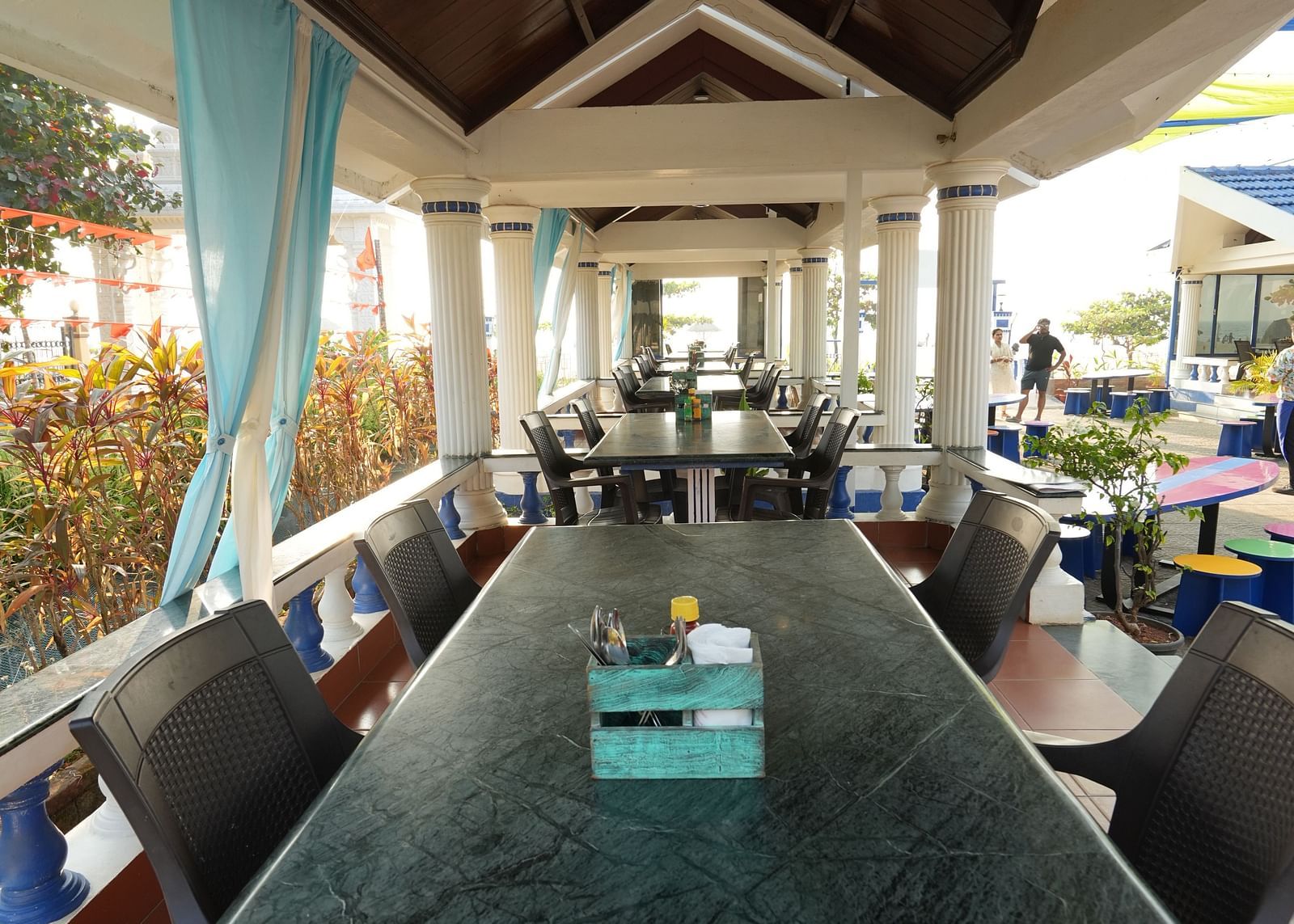 A view of a table in a restaurant at Paradise Isle Beach Resort, Udupi