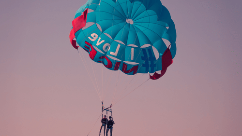 Parasailing during sunset