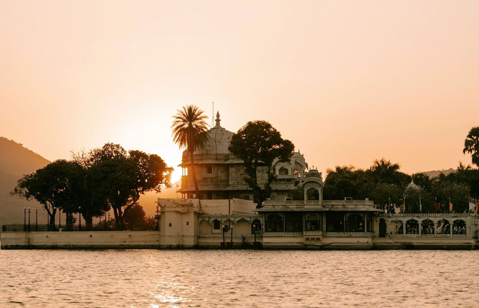 A building stands near a body of water.