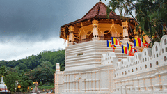 a white exterior facade of a temple