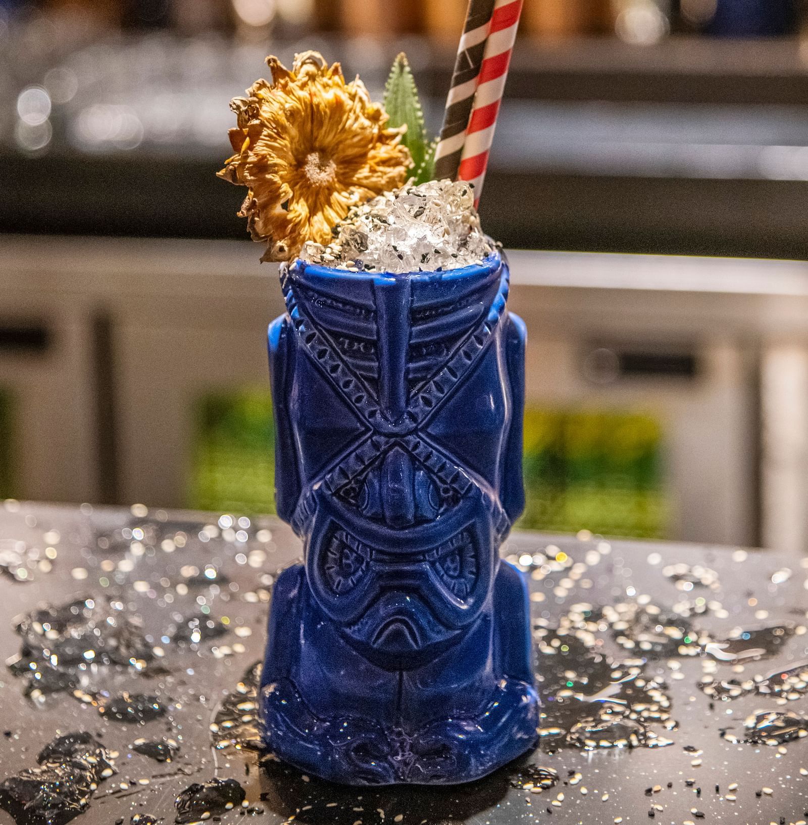 image of the signature cocktail - city of birds served at the aura bar at The Claridges New Delhi