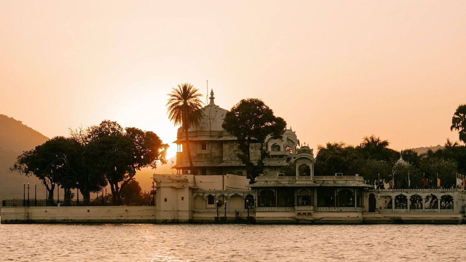 A building stands near a body of water.