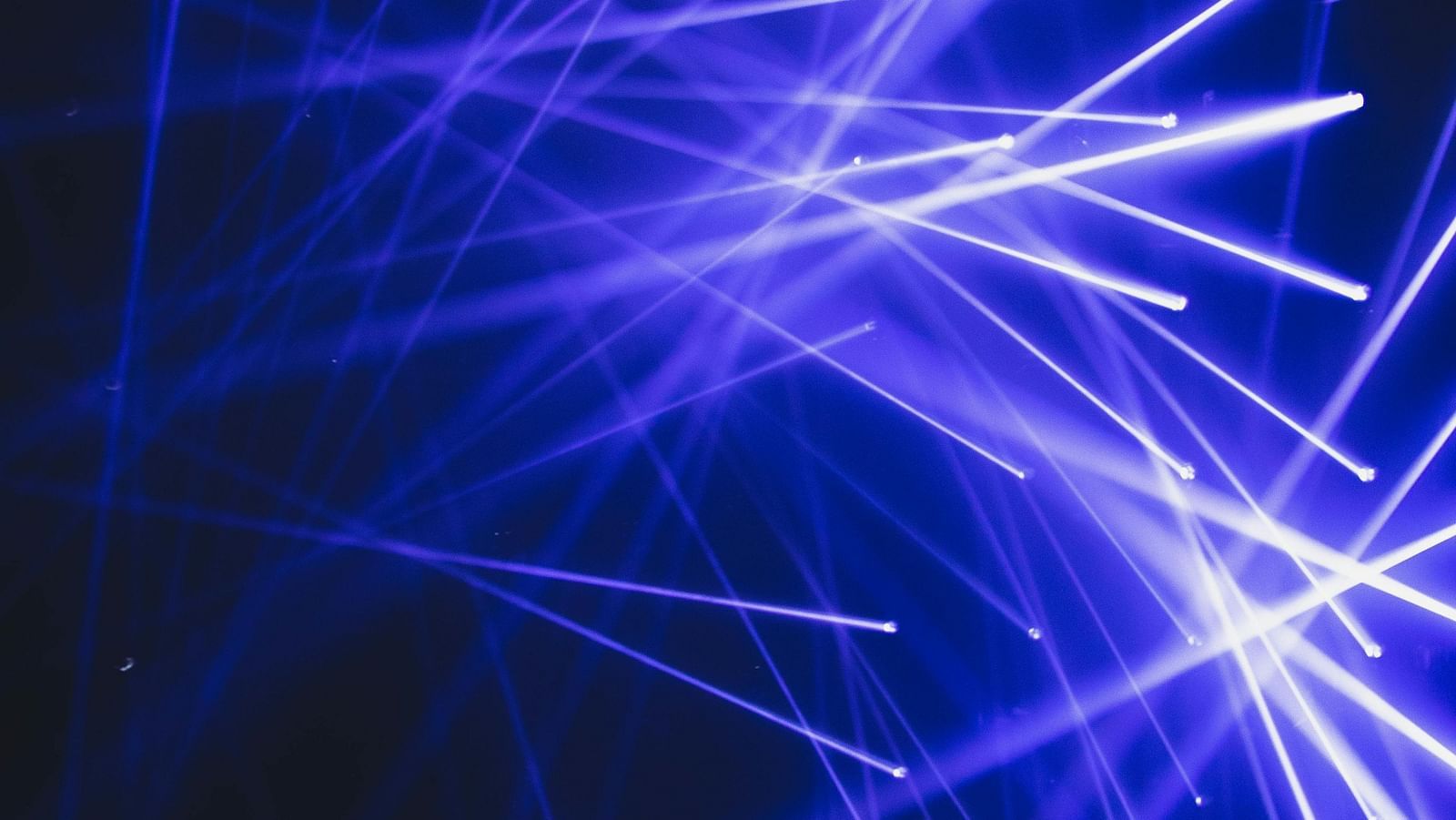image of blue lights illuminating from the fountain