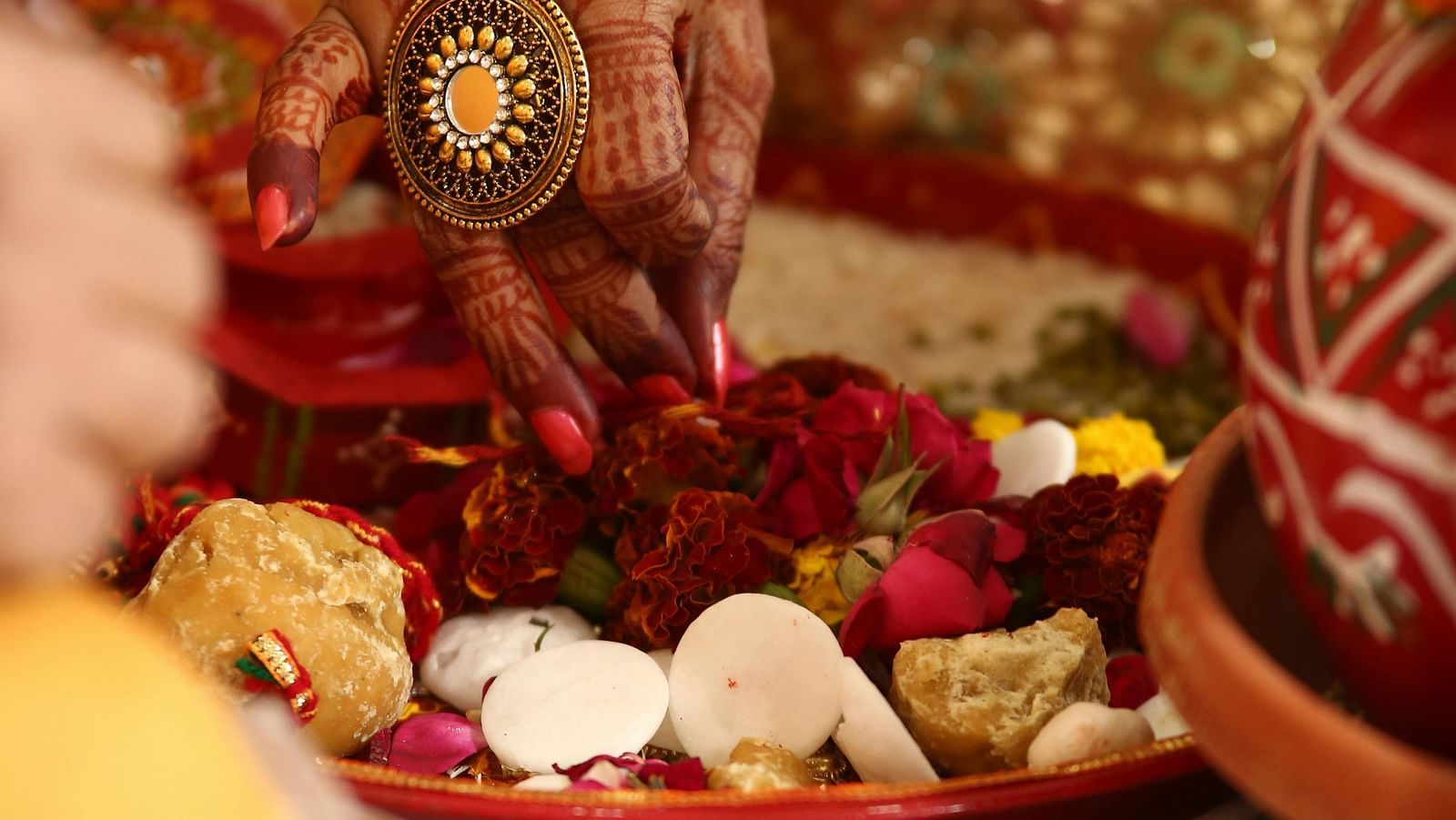 A bride performing a ritual.
