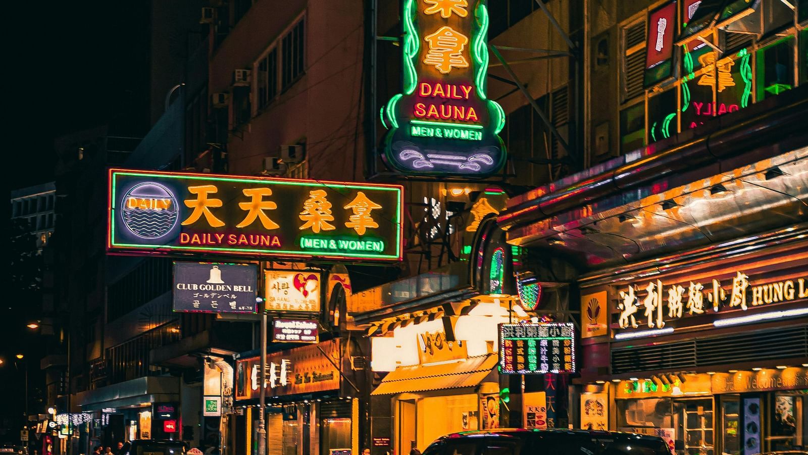 an image of china town in bangkok illuminated by colourful lights