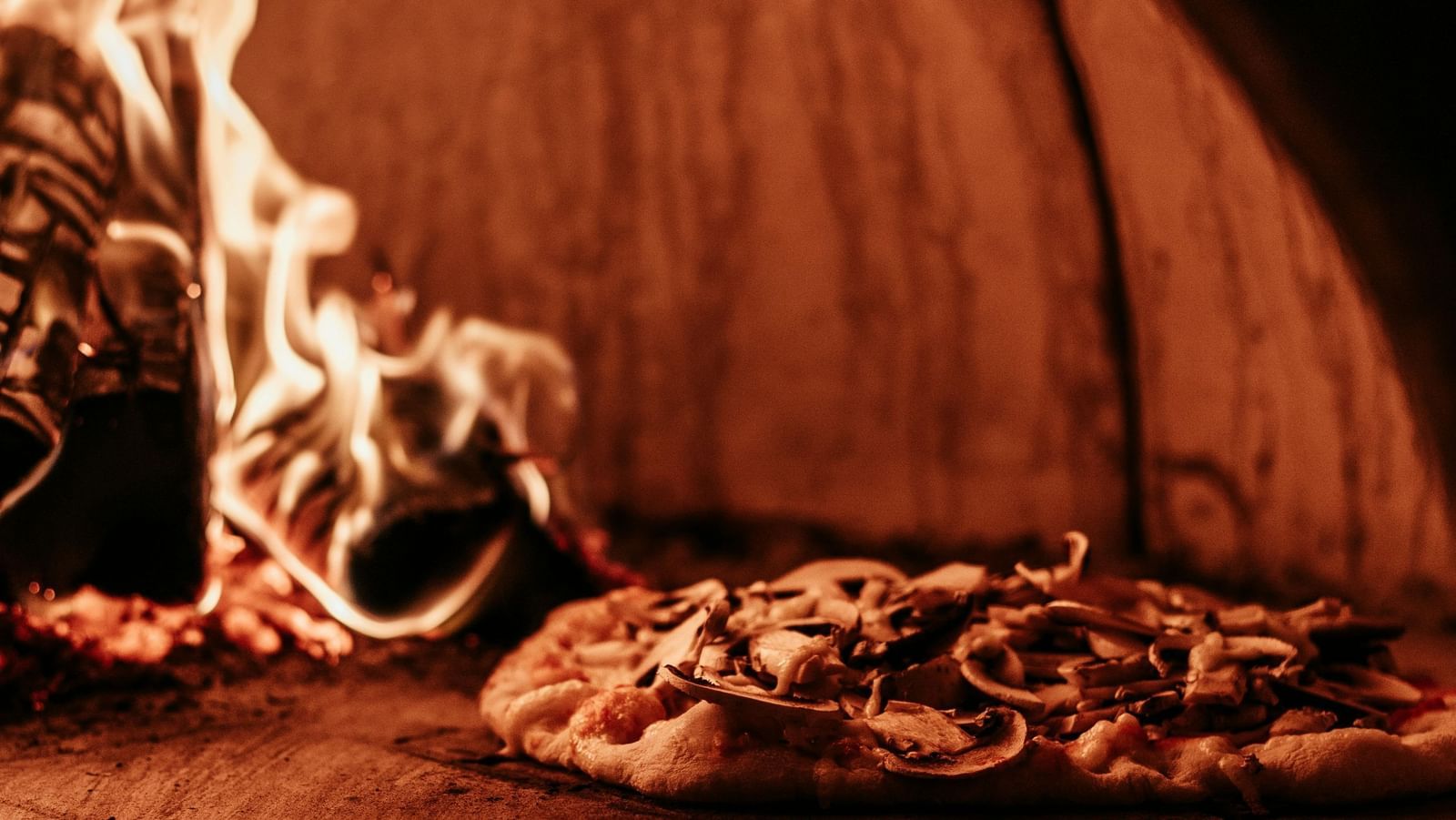 Traditional wood fire furnace in which a pizza is placed for cooking.