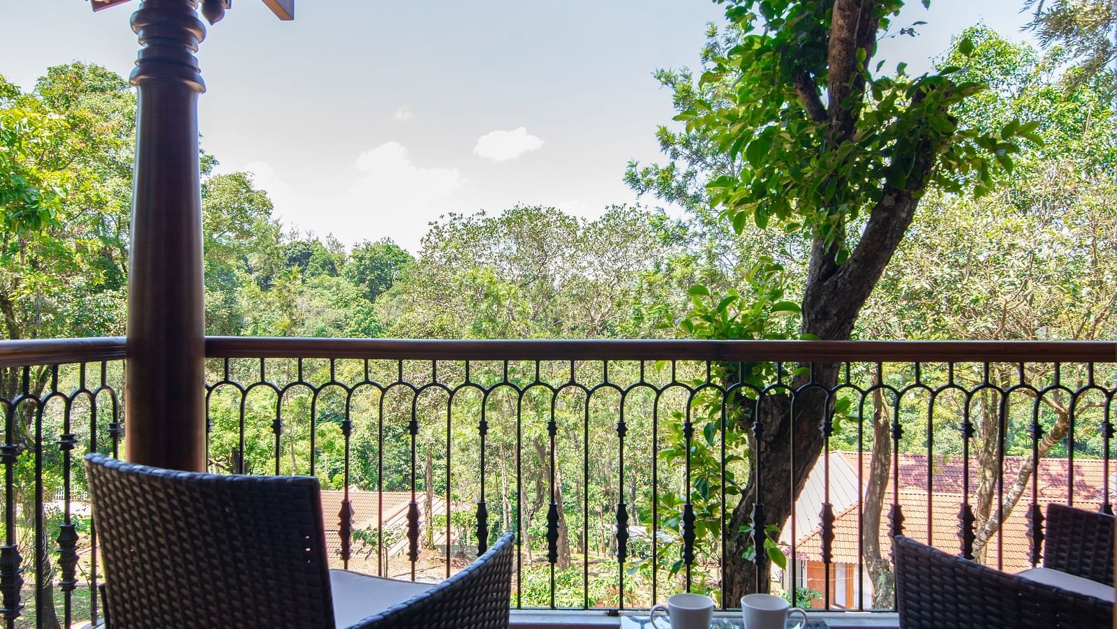 balcony with chairs- Tapovana, Sakleshpura