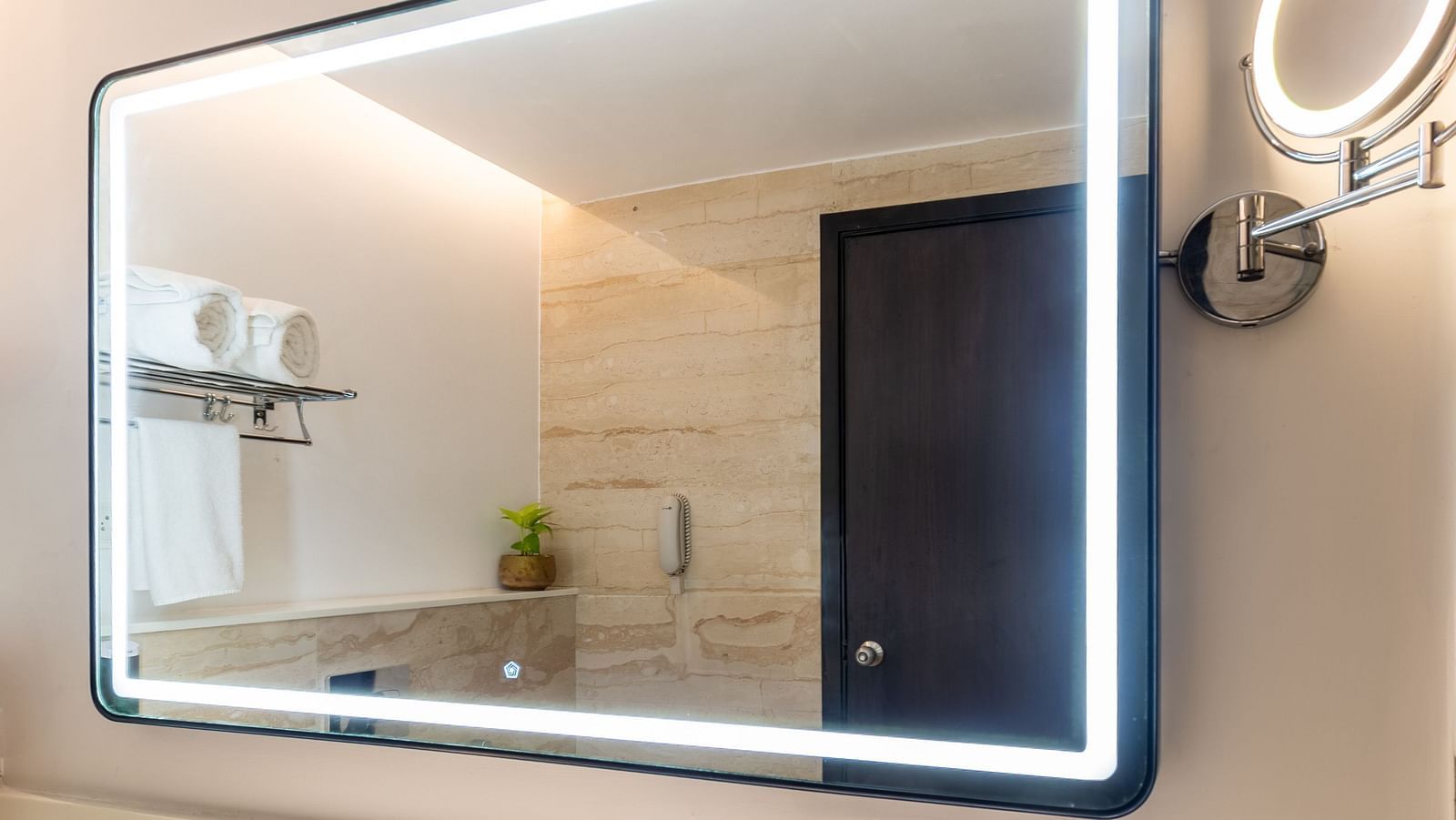 Bathroom sink area with LED-lit mirror and open shelving, Grand Suite- TGI Grand Fortuna, Krishnagiri Main Road, Hosur