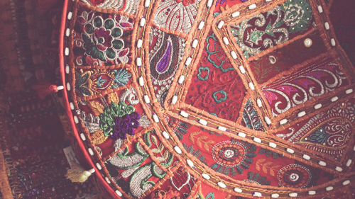 Vibrant traditional Indian embroidery with mirror work.