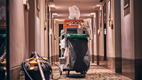 Housekeeping trolley in a hotel corridor