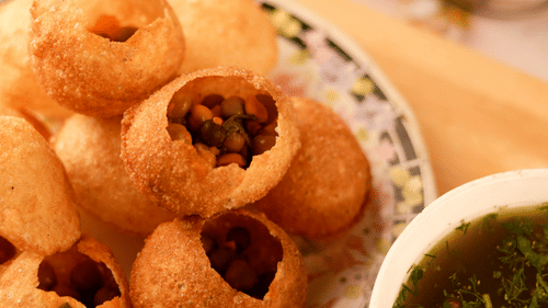 Indian street food fuchka with mint water