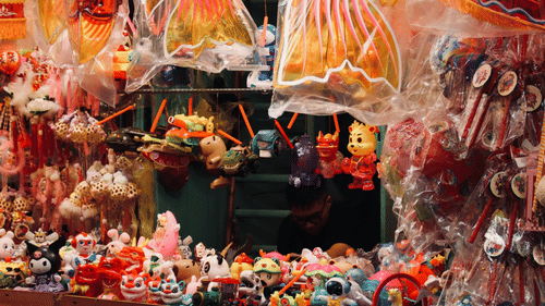 A display of various arts and crafts for sale.