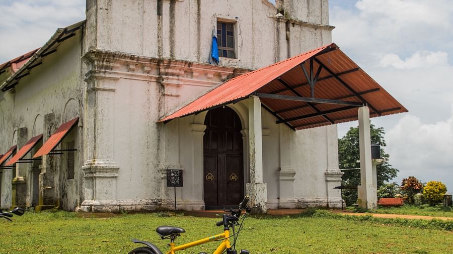 a bicycle in front of a church