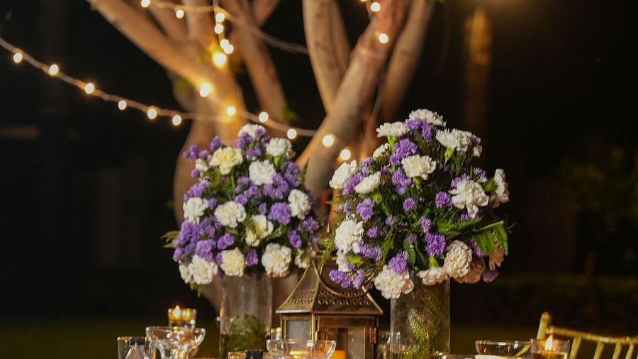 Beautifully decorated table with candles and flowers, perfect for a romantic dinner