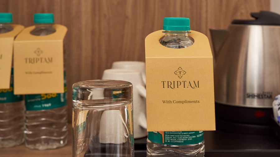 water bottles and tea/coffee maker in one of the rooms at Triptam Hotel, Vrindavan