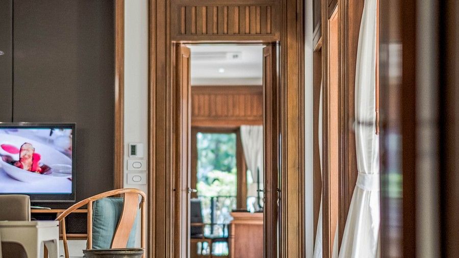 image of the pathway leading towards the bedroom from the living room - one bedroom private pool beachfront villa