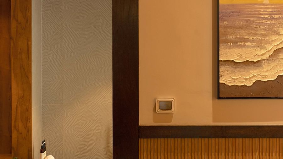 A glimpse of the battub from the bedroom of the Coral Teal Suite at Coral Reef Resort and Spa in Havelock