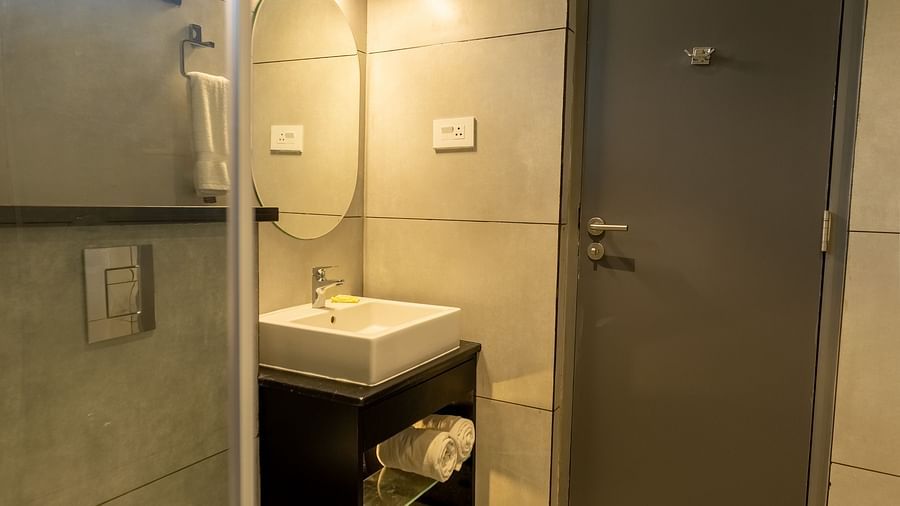 image of the bathroom featuring a commode and a wash basin at the luxury group stay villa - Darza Resorts