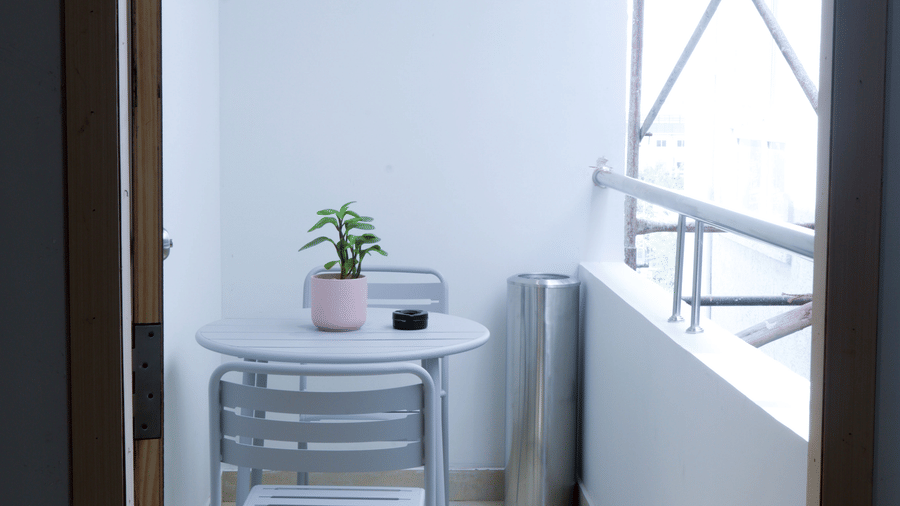 Private balcony with seating and open view in Luxury Suite at Hotel Kyzen HiTech City – Your Zenly Stay.