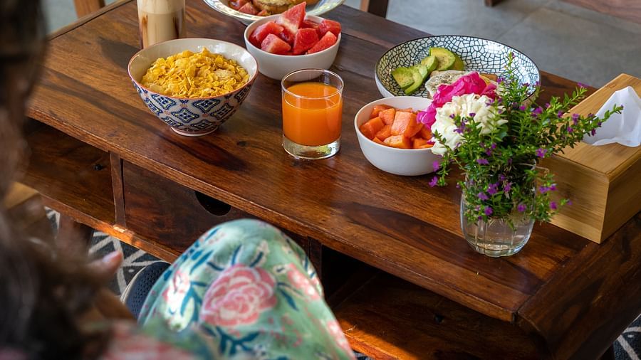 a table set with food and beverages at Neer Ganga Resorts