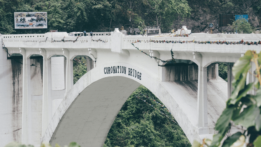 Coronation Bridge as seen from far out with trees in the background