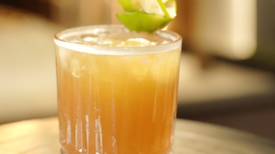 Citrine Hotel | A glass placed on a table with drinks in it.