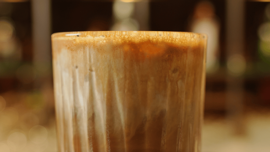 Citrine Hotel | A glass placed on a table with drinks in it.