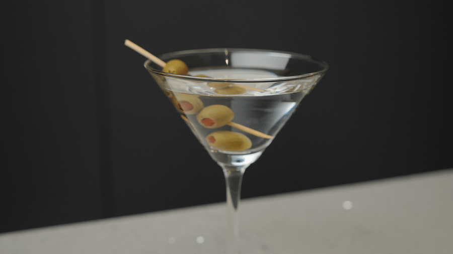 Citrine Hotel | A glass placed kept in a plate with drinks in it.