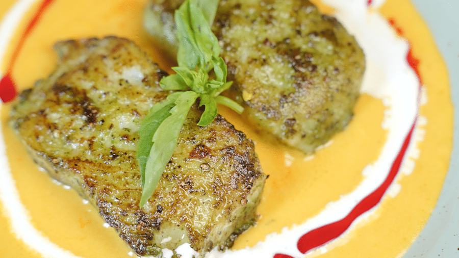 A gourmet placed on a plate with sauce around it. | Citrine Hotel
