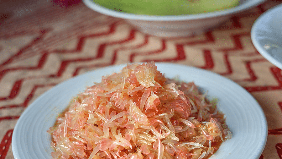A close up shot of a fruit served on a plate at the Sylvan Retreat, Dehradun.